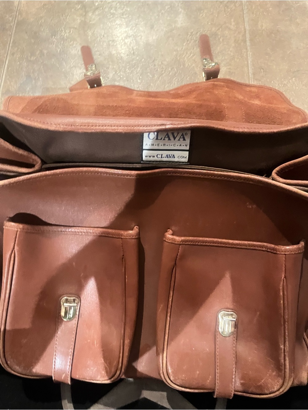 Beautiful hand made leather Clava Brief Case with brass buckles and space.
